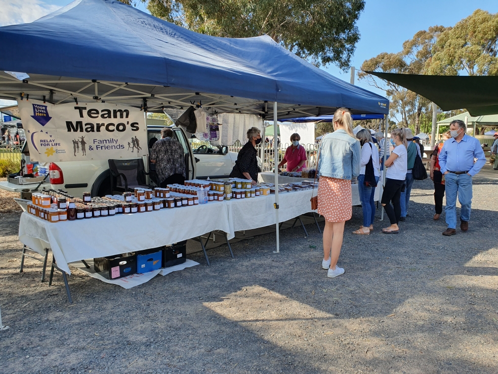 A busy produce stall at the Haven Market